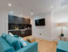 80 Rodney Street - Turquoise Living Area with TV