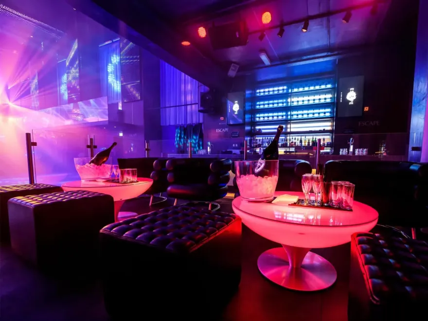 Nightclub Entry with Table & Drinks