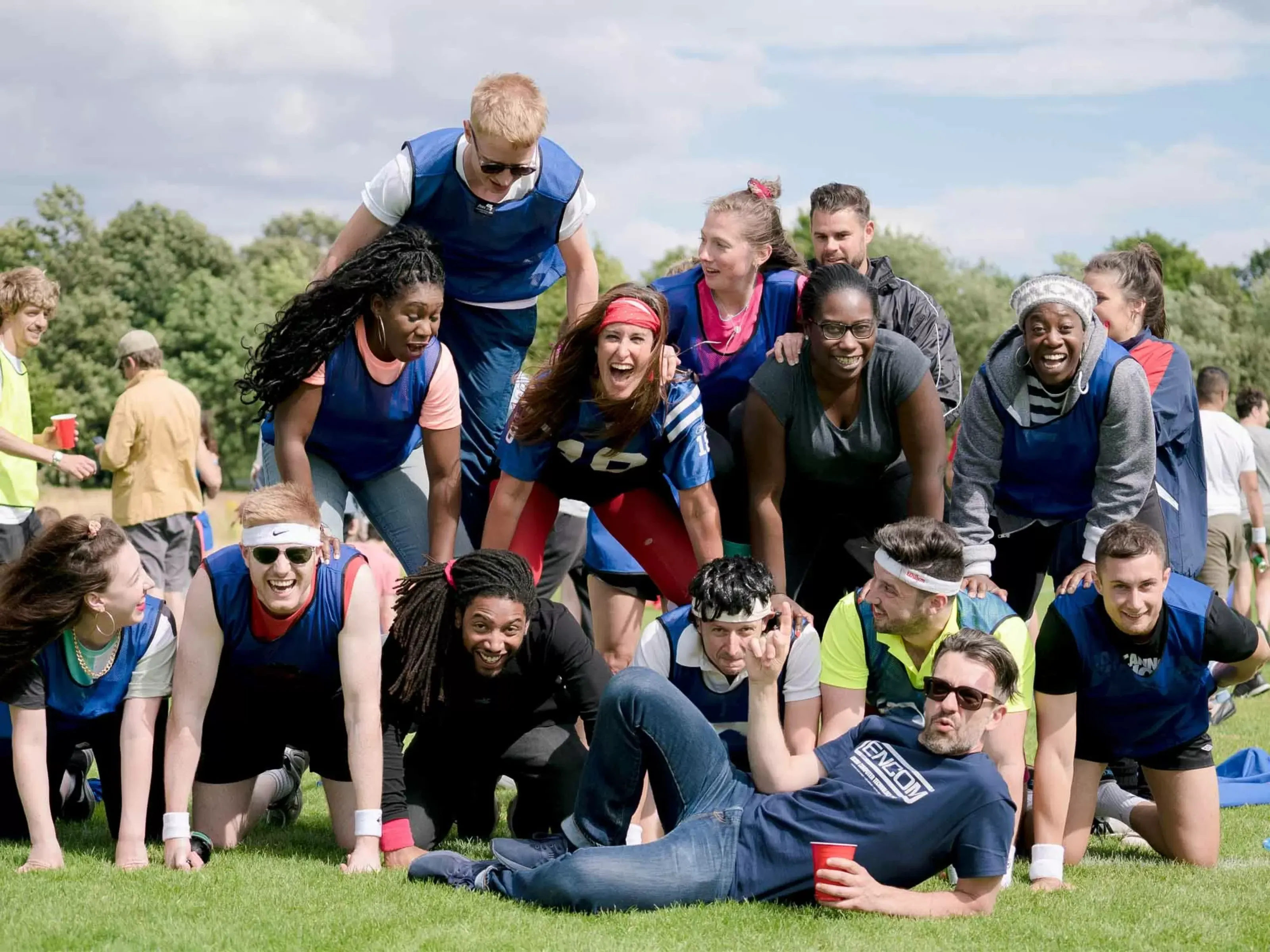 Colleagues taking part in a corporate sports day company away day