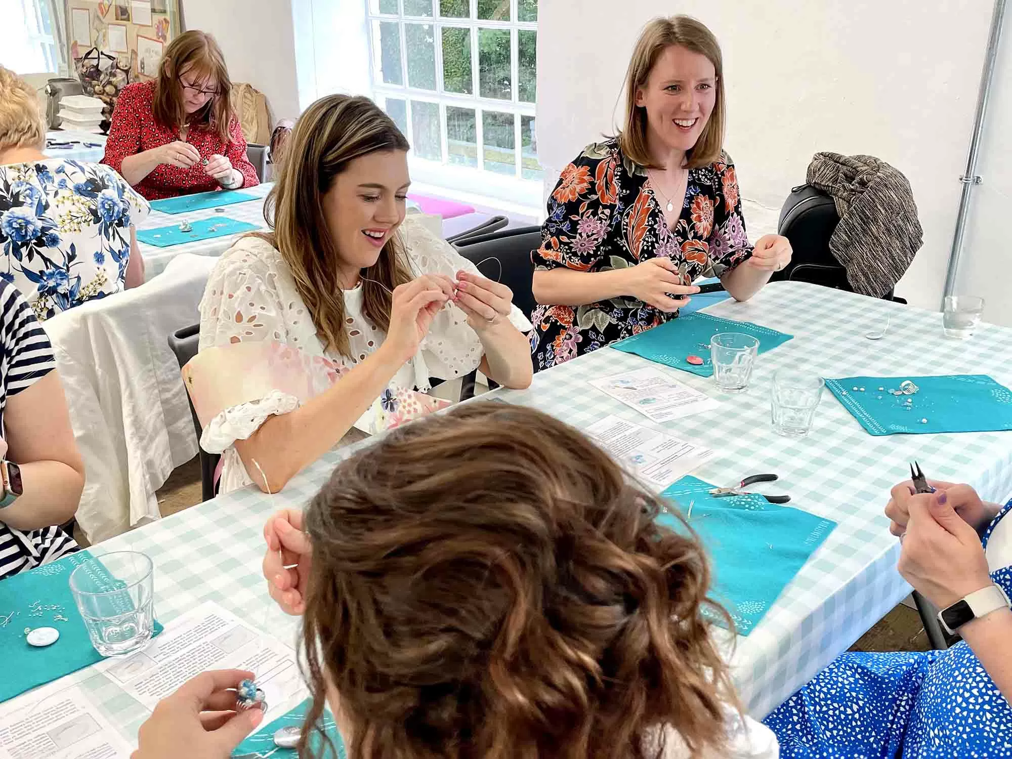 Colleagues making handmade crafts together in a Manchester venue