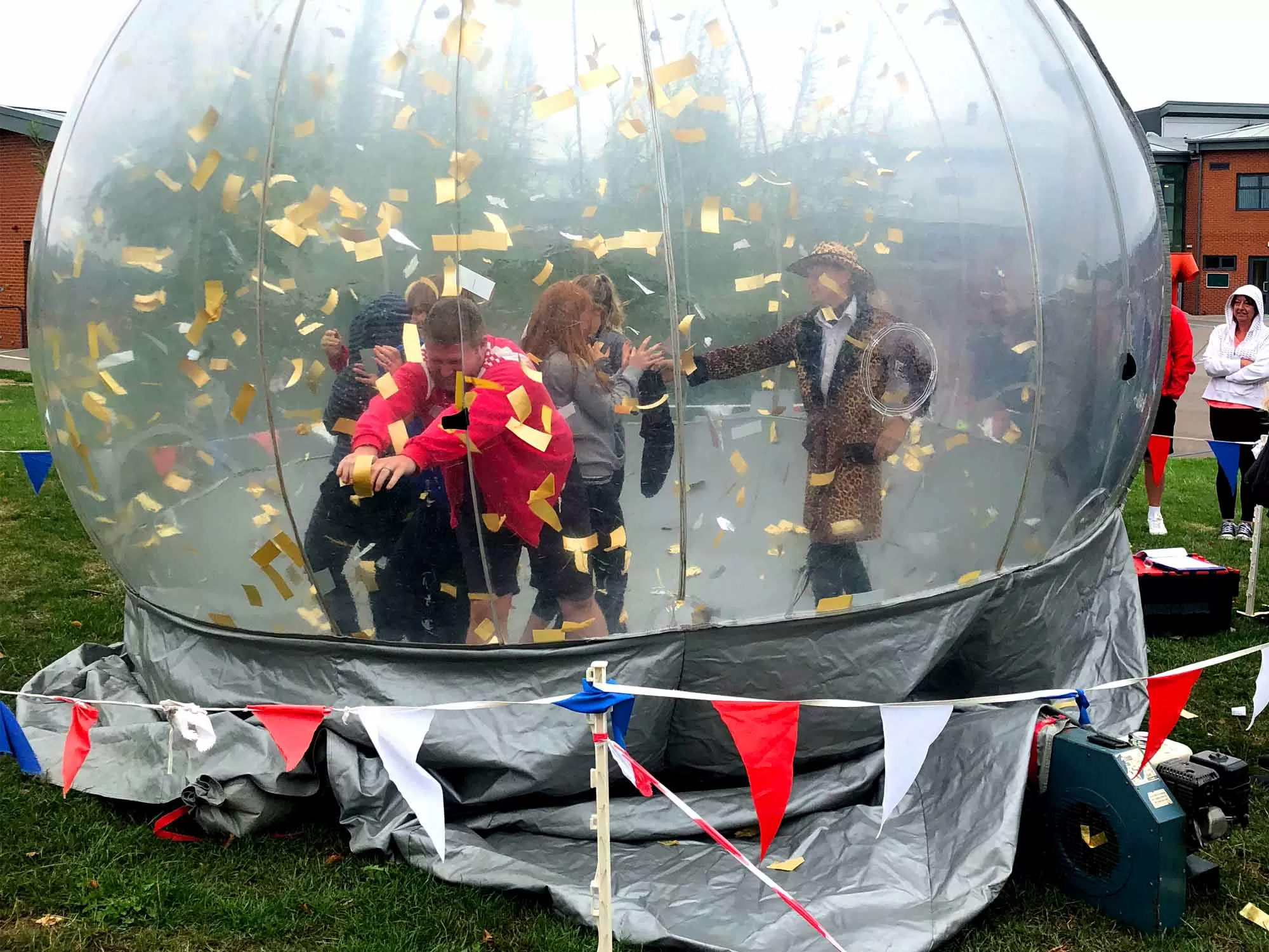 Team competing in Crystal Maze-style outdoor challenge in Manchester