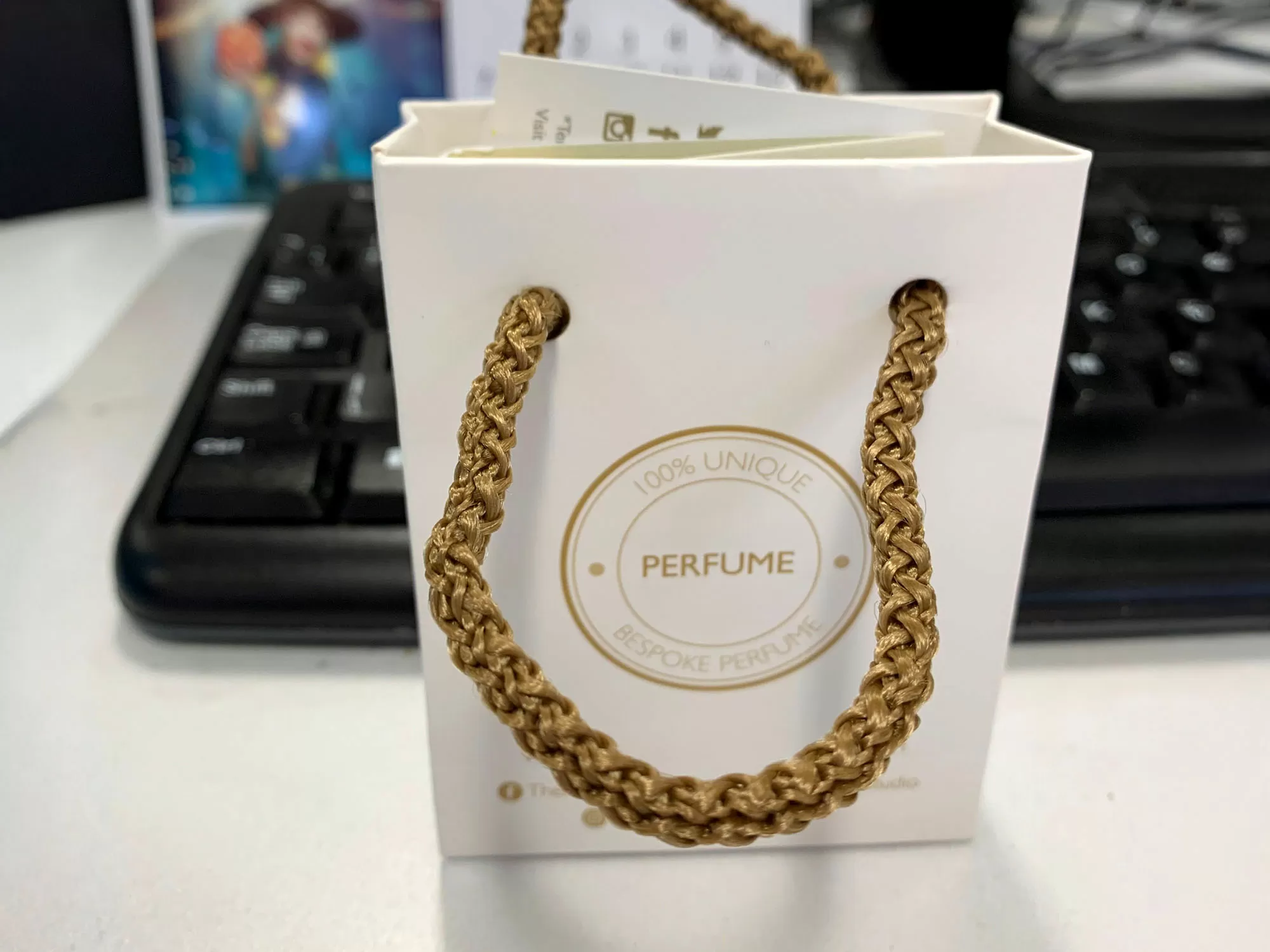 Team creating personalised fragrances at a perfume making class in Manchester