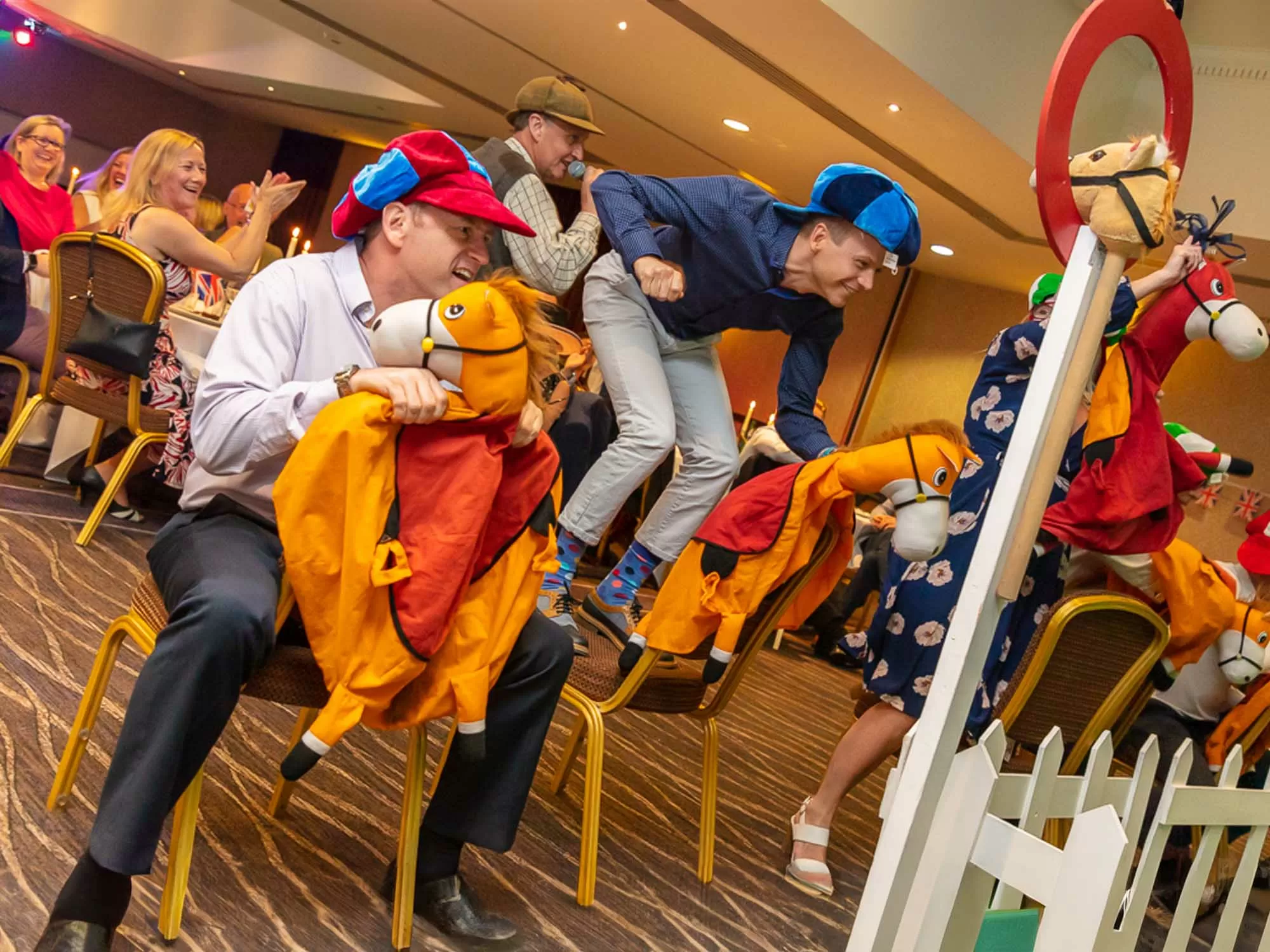 Team enjoying indoor race night entertainment in Manchester